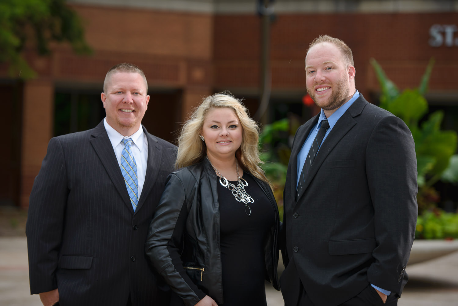 3-person real estate team photo in St Peters