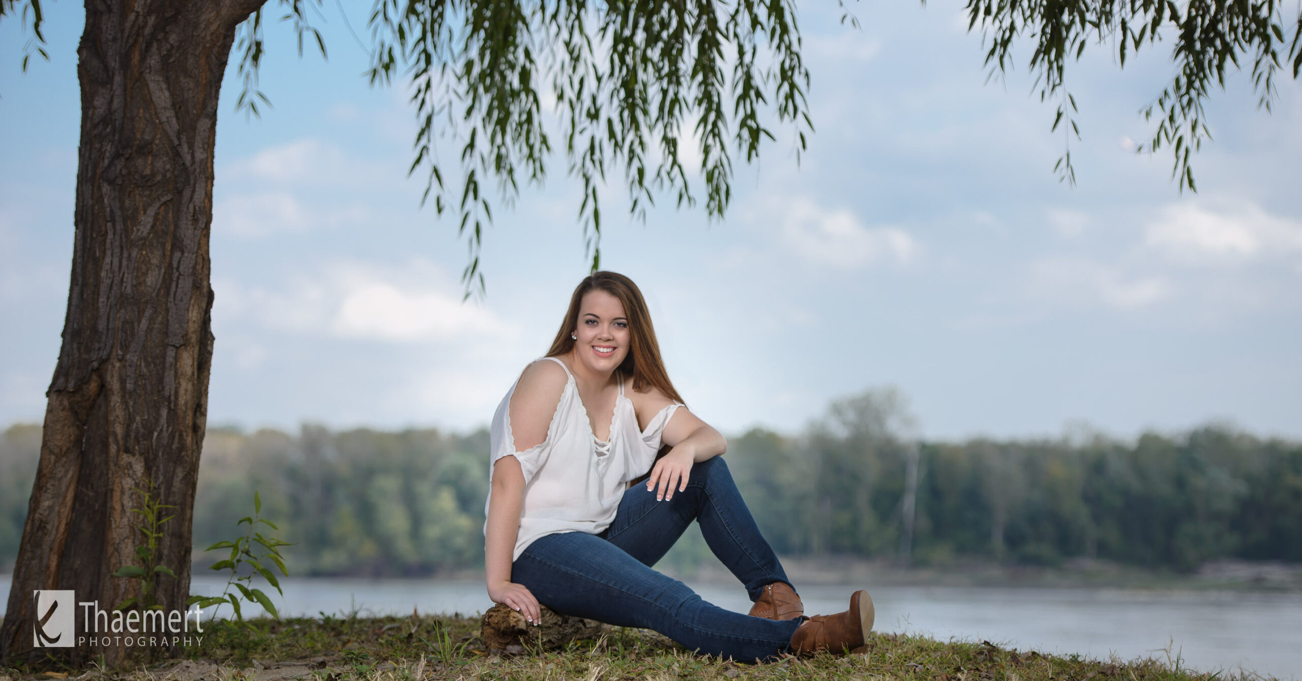 Relaxed Senior Picture at the riverfront St Charles