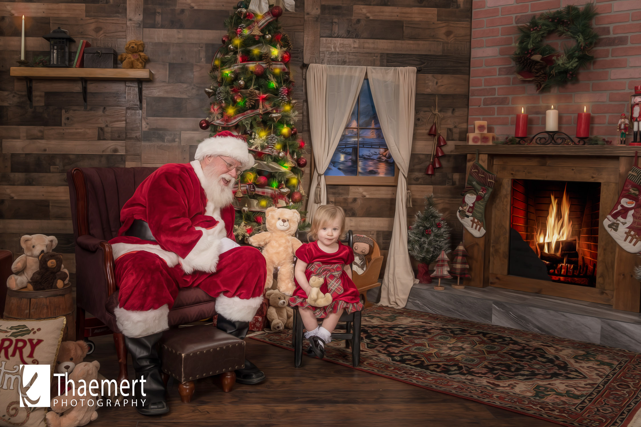 Santa and his Teddy Bear visit a toddler girl