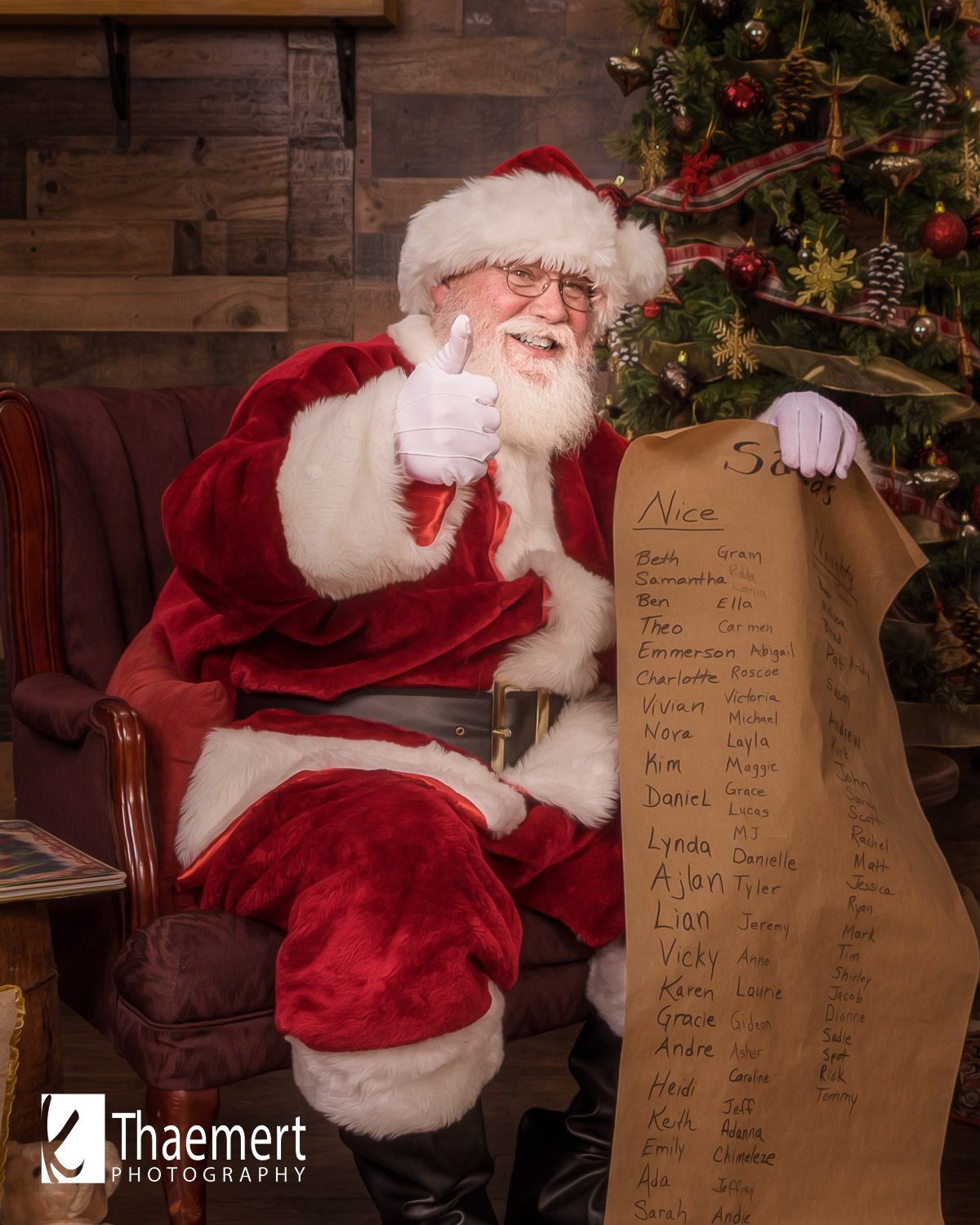 Santa Checking his list before the next photo session